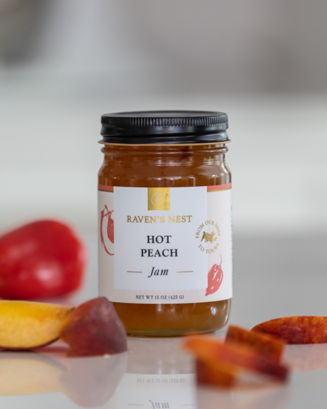 Hot Peach Jam Jar with Peach Sliced around it
