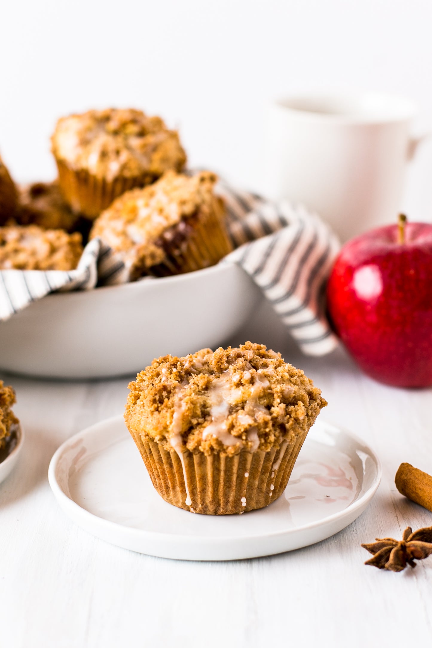 Apple Butter Muffins topped with drizzled icing