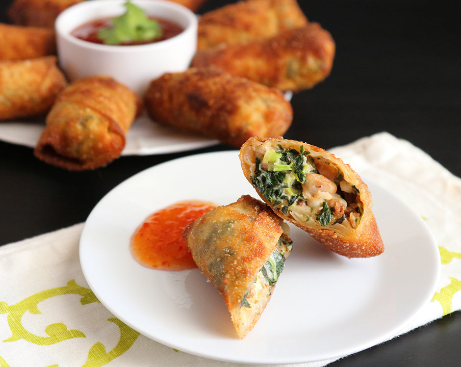 Southern style egg rolls filled with Raven's Nest chili grande spiced ground pork, black eyed peas, and collard greens, served with a side of mango habanero jam