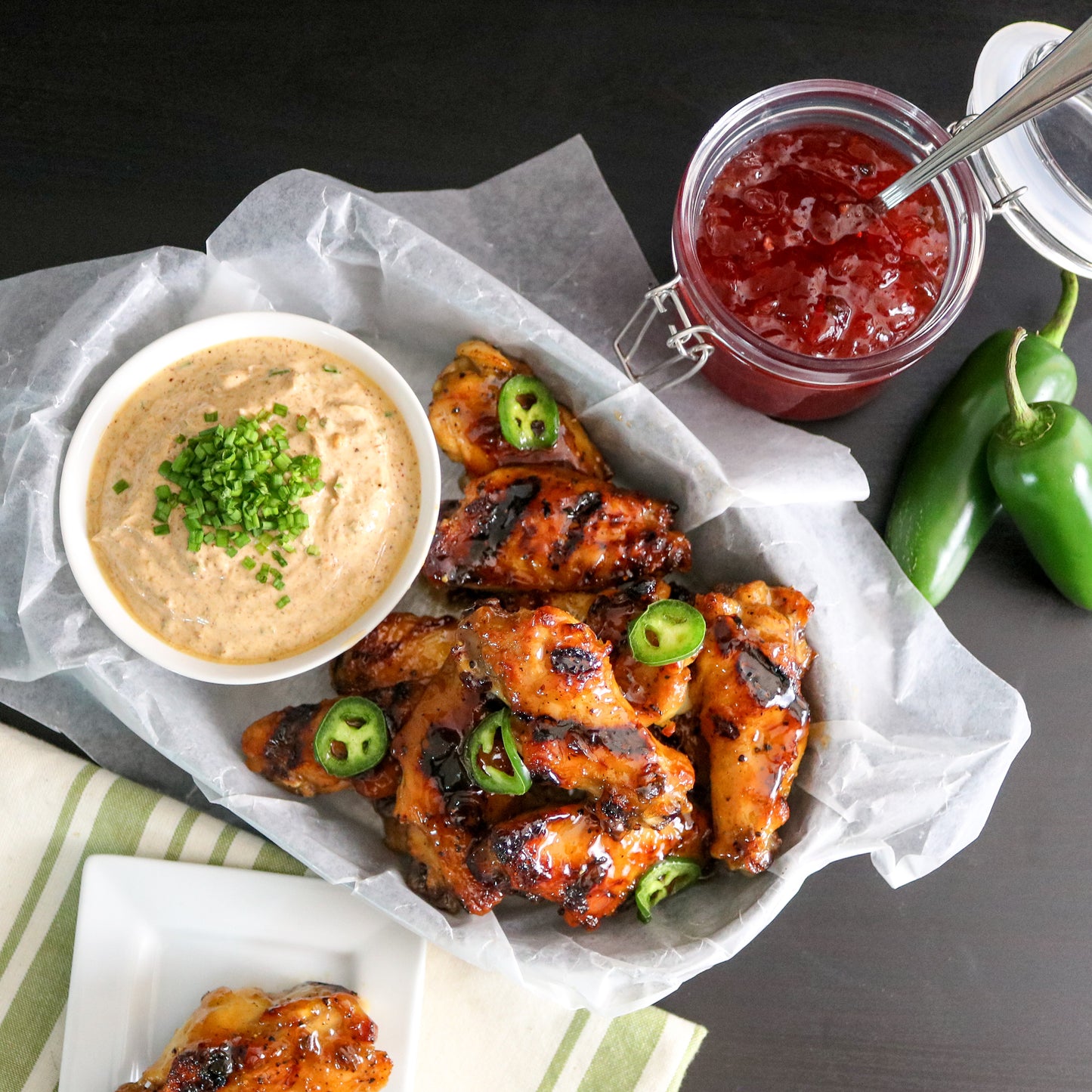 Strawberry Jalapeno Wings Chili Yogurt Sauce topped with Jalapeno Slices