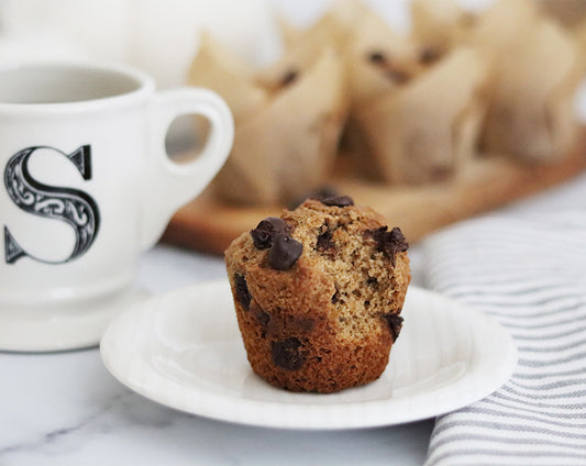 Pumpkin butter muffins with chocolate chips and a cup of coffe