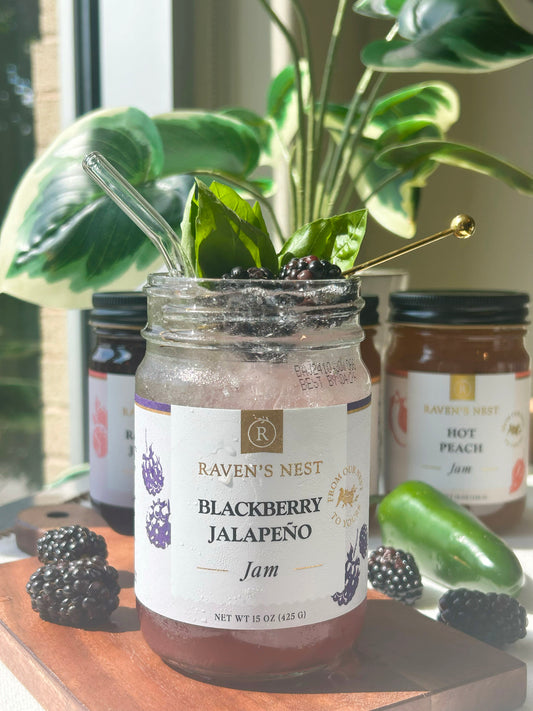 Non-alcoholic blackberry jalapeno mocktail recipe made from Ritual Zero Proof NA gin and Raven's Nest blackbery jalapeno jam, garnished with fresh blackberries and basil or mint leaves