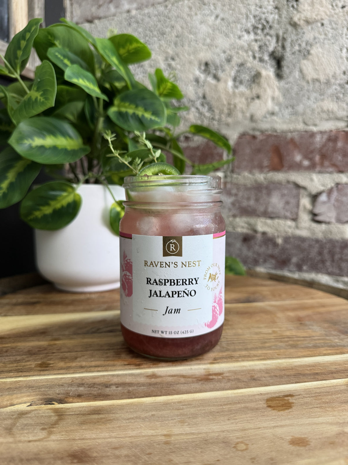 Make a refreshing Raspberry Jalapeño Jamtail Jar with leftover Raven’s Nest Raspberry Jalapeño Jam, gin, fresh lemon juice, and soda or tonic water.