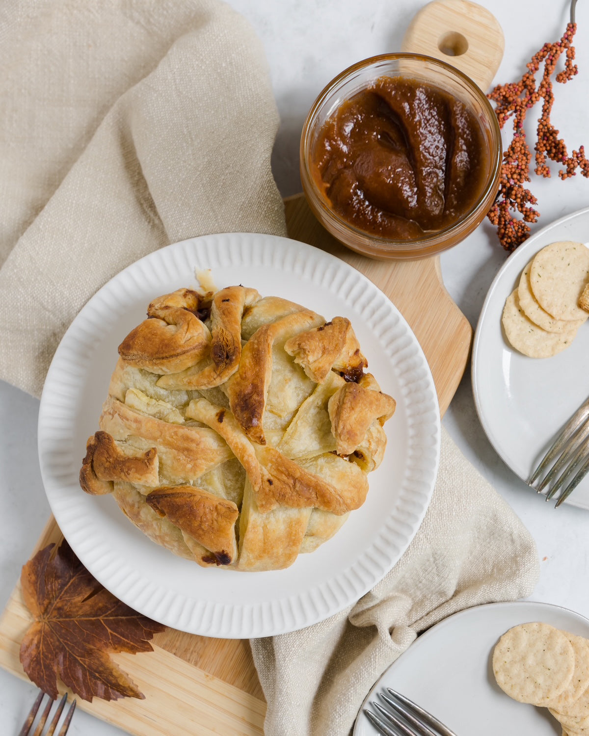 Ravens Nest Pumpkin Butter Baked Brie with Fall background 