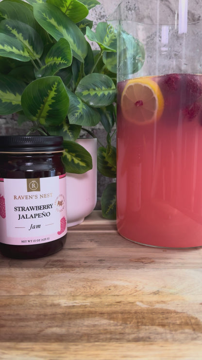 Make refreshing Strawberry Jalapeño Sangria with Raven’s Nest Strawberry Jalapeño Jam Simple Syrup, Sauvignon Blanc, fresh berries, lemon, and club soda.
