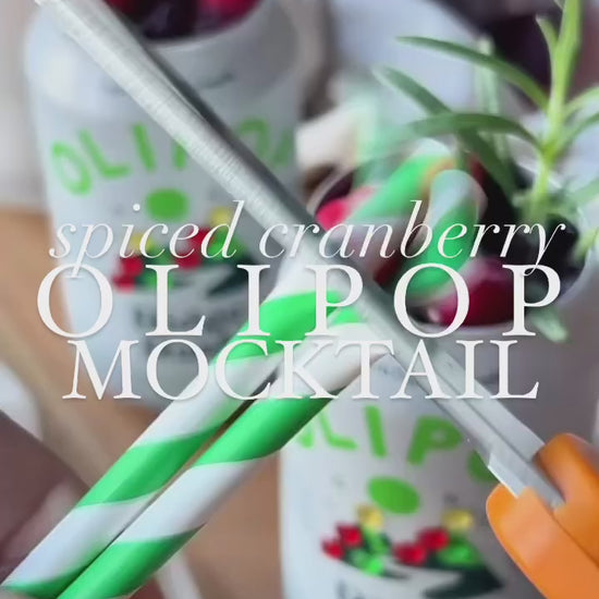 Spiced Cranberry Mocktail made with Olipop and Raven's Nest Original Mulling Spices