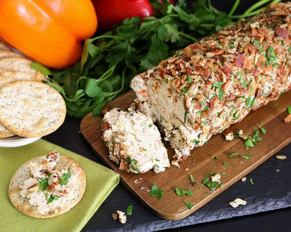 Bacon blue cheese log served with crackers and topped with walnuts and crumbled bacon