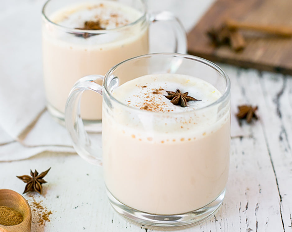 Homemade chai latte made with Raven's Nest mulling spice and garnished with star anise