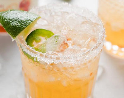 Hot peach margarita made with Raven's Nest sweet and spicy hot peach jam